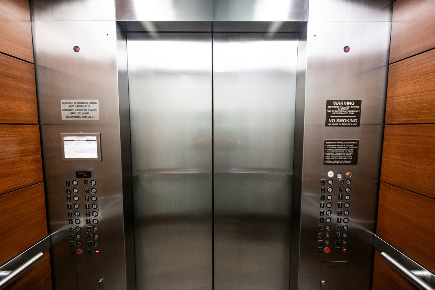 Stainless-steel lift doors with call panel